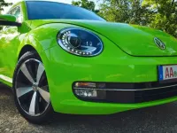 Gebraucht VW Beetle Exclusive 105 PS (77 kW) 2013 Grün Kleinwagen