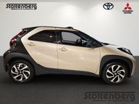 Gebraucht Toyota Aygo X Basis 72 PS (52 kW) 2025 Ginger beige / night sky blackmetallic / night sky SUV