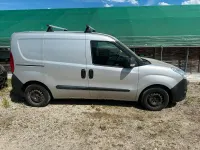 Używany Opel Combo 90 KM (66 kW) 2014 Srebrny Minivan