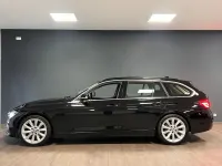 Second-hand BMW 330 Luxury Line 252 CP (185 kW) 2015 Negru Break