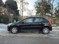 Gebraucht Peugeot 206+ 74 PS (54 kW) 2011 Schwarz Kleinwagen