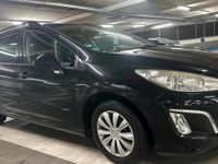 Gebraucht Peugeot 308 120 PS (88 kW) 2012 Schwarz Kombi