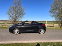 Second-hand Renault Wind Dynamique 101 CP (74 kW) 2010 Negru Cabrio