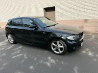 Second-hand BMW 116 122 CP (89 kW) 2010 Negru Hatchback