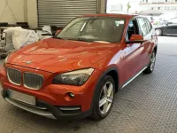 Second-hand BMW X1 143 CP (105 kW) 2013 Portocaliu SUV