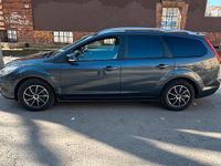 Gebraucht Ford Focus 100 PS (73 kW) 2011 Grau Kombi