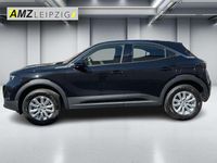Gebraucht Opel Mokka Enjoy 131 PS (96 kW) 2023 Lackierung schwarz perla nera/typ aussen (metallic) SUV