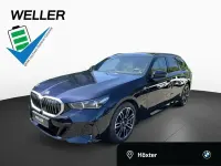 Gebraucht BMW 550e M Sport 489 PS (359 kW) 2025 Carbonschwarz (schwarz) Kombi