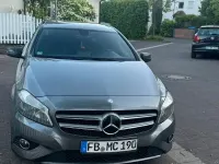 Używany Mercedes A180 129 KM (94 kW) 2012 Szary Sedan/Limuzyna