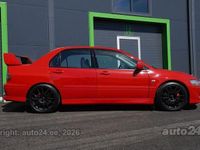 Second-hand Mitsubishi Lancer 265 CP (194 kW) 2004 Roșu Berlinǎ