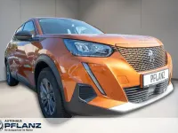 Gebraucht Peugeot e-2008 Active 100 kW (136 PS) 2022 Orange SUV