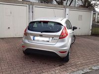 gebraucht Ford Fiesta 1,25 60kW/Klima/SHZ/FreiSpr/HU+Reifen neu