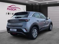 Gebraucht Opel Mokka-e Edition 100 kW (136 PS) 2022 Kontrast grau/quarz silber SUV