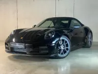 Gebraucht Porsche 992 394 PS (289 kW) 2025 Schwarz (metallic) Cabrio