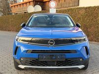 Gebraucht Opel Mokka Elegance 101 PS (74 kW) 2023 Perl blau/voltaik blau SUV
