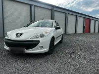 Gebraucht Peugeot 206+ 75 PS (55 kW) 2011 Weiß Kleinwagen