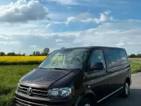 Używany VW Multivan 114 KM (83 kW) 2013 Purpurowy Minivan