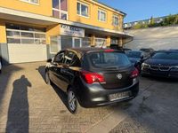 Używany Opel Corsa Edition 90 KM (66 kW) 2016 Czarny Sedan/Limuzyna