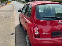 Gebraucht Nissan Micra 65 PS (47 kW) 2010 Rot Kleinwagen