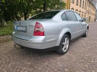 Second-hand VW Passat 180 CP (132 kW) 2004 Argintiu Berlinǎ