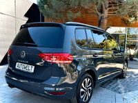 Używany VW Touran Active 150 KM (110 kW) 2022 Zielony Minivan