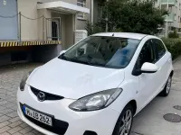 Gebraucht Mazda 2 75 PS (55 kW) 2010 Weiß Kleinwagen