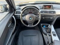 Second-hand BMW 320 184 CP (135 kW) 2013 Negru Berlinǎ