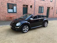 Gebraucht VW New Beetle 102 PS (75 kW) 2010 Schwarz Kleinwagen