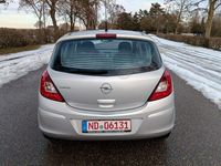Second-hand Opel Corsa Edition 80 CP (58 kW) 2009 Argintiu Berlinǎ