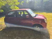 Gebraucht Daihatsu Trevis 58 PS (42 kW) 2006 Rot Kleinwagen