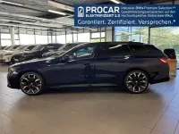 Gebraucht BMW 550e M Sport 489 PS (359 kW) 2025 Blau Kombi