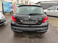 Gebraucht Peugeot 207 73 PS (53 kW) 2011 Schwarz Kleinwagen
