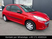 Gebraucht Peugeot 206 Basis 73 PS (53 kW) 2012 Rot Kleinwagen