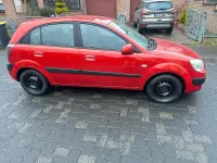 Używany Kia Rio 90 KM (66 kW) 2009 Czerwony Hatchback