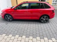 Używany Skoda Rapid Ambition 105 KM (77 kW) 2014 Czerwony Hatchback