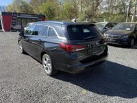 Używany Opel Astra Dynamic 136 KM (100 kW) 2016 Czarny Sedan/Limuzyna