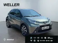 Gebraucht Toyota Aygo Pulse 72 PS (52 kW) 2023 Cardamon green / black mica (gruen) Kleinwagen