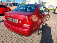 Second-hand VW Bora 100 CP (73 kW) 1999 Roșu Berlinǎ