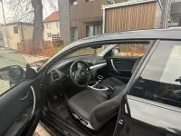 Gebraucht BMW 116 116 PS (85 kW) 2010 Schwarz Kleinwagen