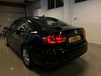 Gebraucht VW Jetta 105 PS (77 kW) 2011 Schwarz Limousine