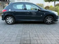 Gebraucht Peugeot 206 60 PS (44 kW) 2012 Grau Limousine