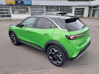 Gebraucht Opel Mokka-e Ultimate 100 kW (136 PS) 2021 Matcha green/ikone gruen SUV
