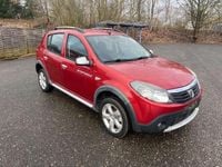 Second-hand Dacia Sandero Stepway 88 CP (64 kW) 2011 Roșu Berlinǎ
