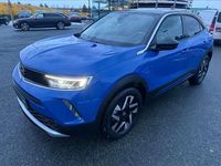 Gebraucht Opel Mokka-e Elegance 100 kW (136 PS) 2023 Lackierung voltaic blue met/ty SUV