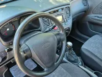 Używany Kia Rio 94 KM (69 kW) 2009 Czerwony Hatchback