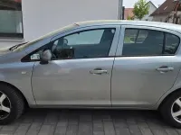 Używany Opel Corsa 75 KM (55 kW) 2010 Szary Hatchback