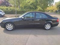 Second-hand Mercedes E200 122 CP (89 kW) 2006 Negru Berlinǎ