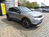 Gebraucht Opel Mokka-e Ultimate 100 kW (136 PS) 2023 Kontrast grau metallic SUV