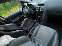 Używany Opel Corsa 75 KM (55 kW) 2010 Czarny Hatchback