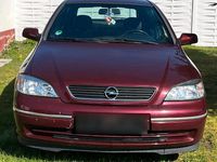 Second-hand Opel Astra 84 CP (61 kW) 2004 Roșu Berlinǎ